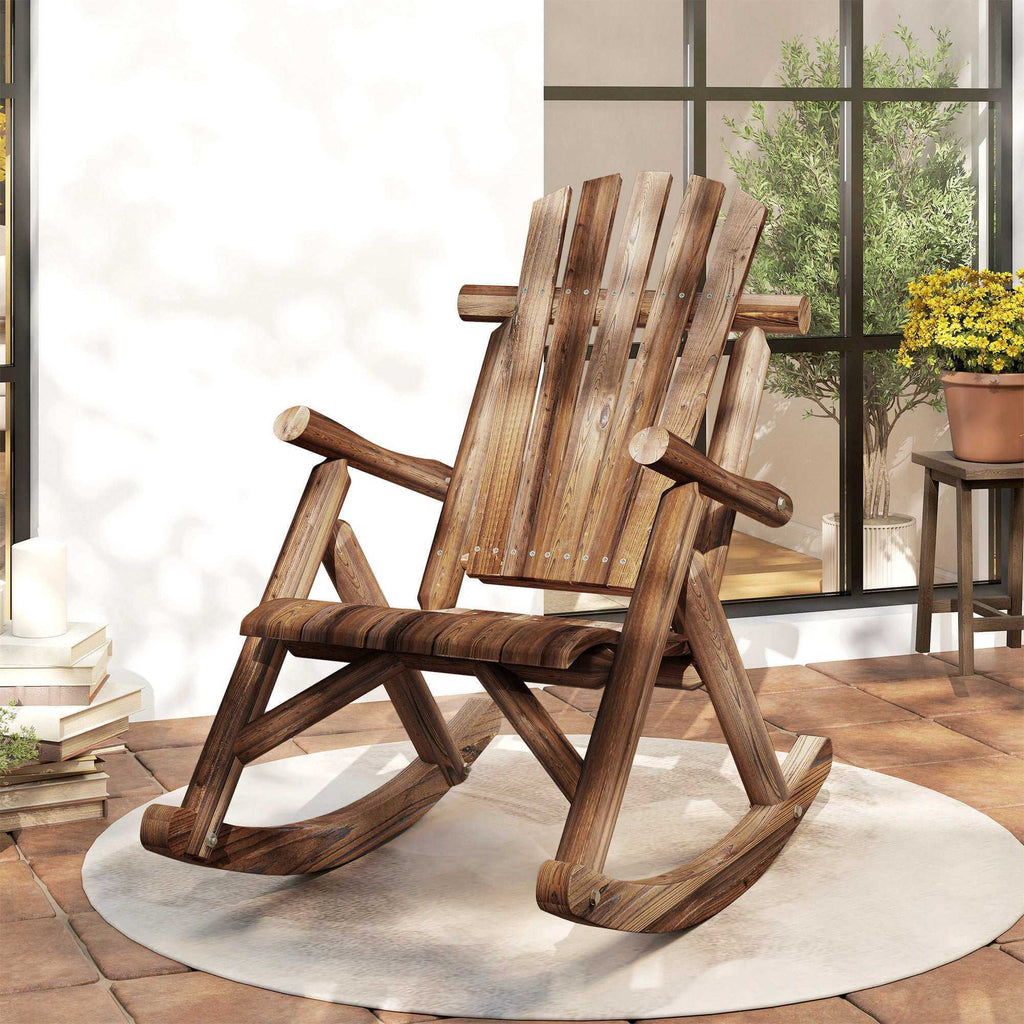Outdoor wooden Adirondack rocking chair with rustic high back and slatted seat in carbonized fir wood