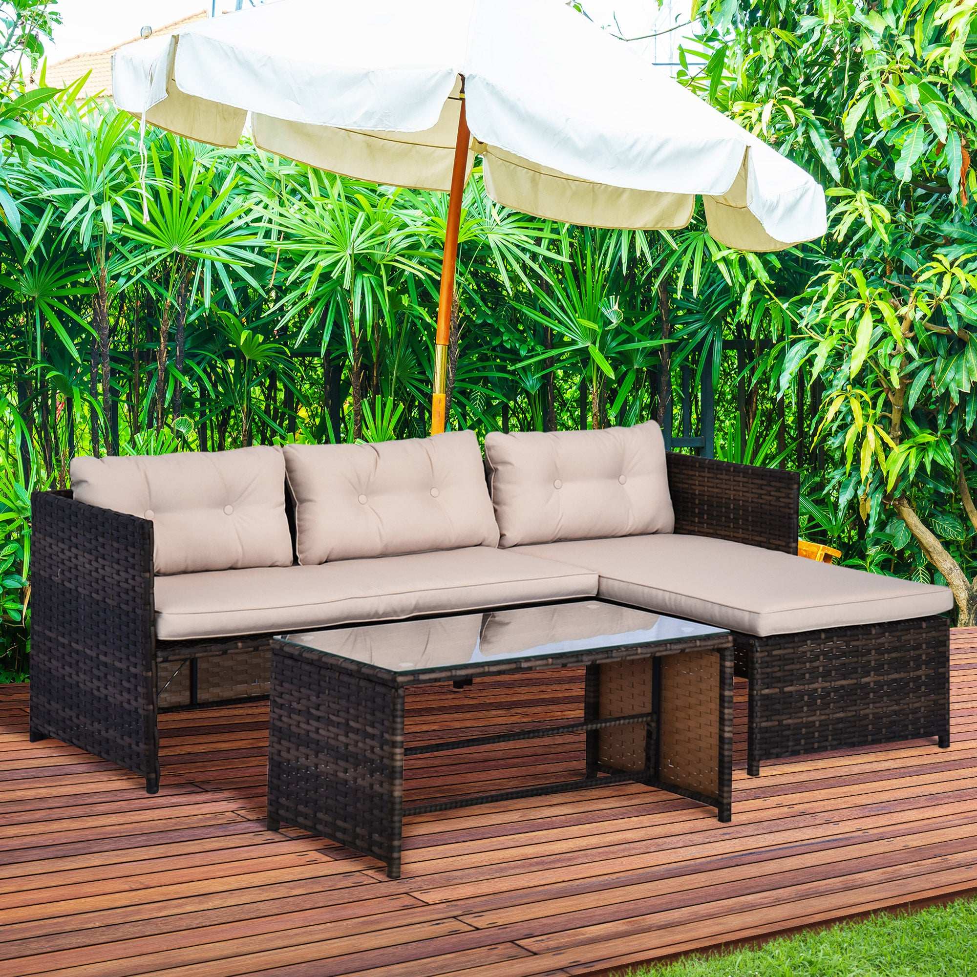 Beige 3 piece patio furniture set with rattan L-shaped sectional, chaise lounge, loveseat, soft cushions, and tempered glass coffee table outdoors