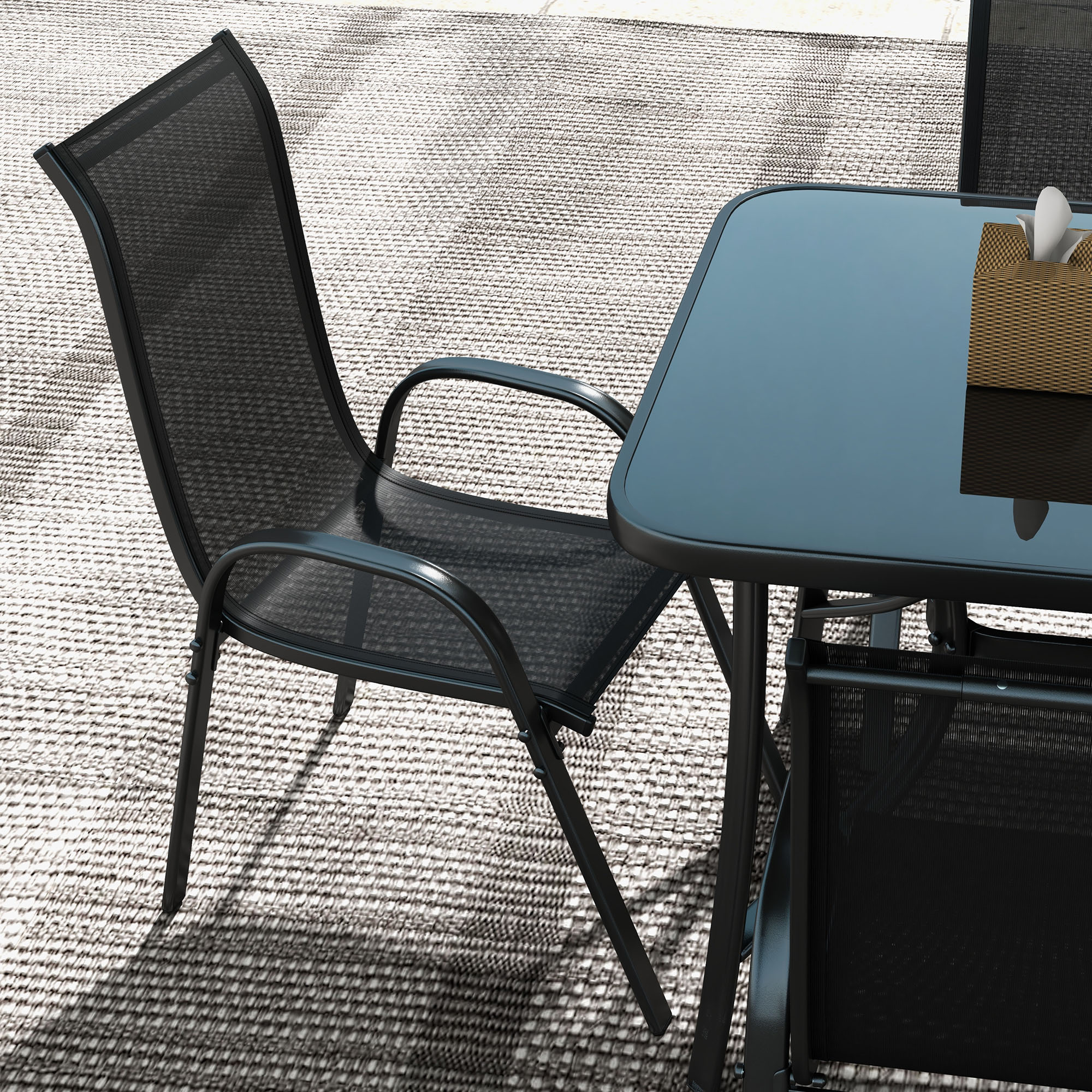 8-piece black outdoor dining set with tempered glass table, 6 mesh chairs, and 9ft tilt umbrella on patio