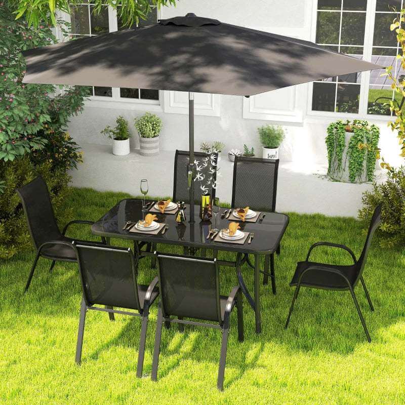 Black 8-piece patio furniture set with dining table, six chairs, and 9ft umbrella