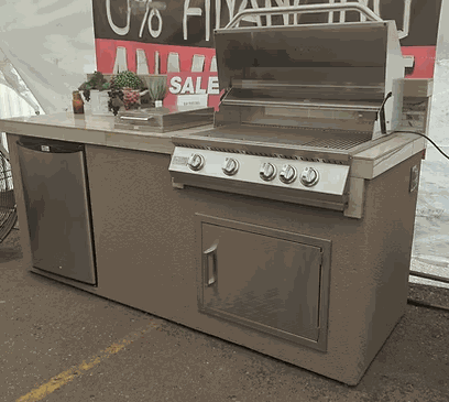 KOKOMO Bali BBQ Island outdoor kitchen with built-in grill, side burner, refrigerator, and backsplash