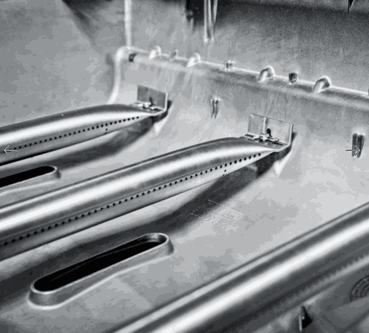 Close-up of Broil King CROWN 310 professional-grade burner with precision-engineered components for optimal performance and durability